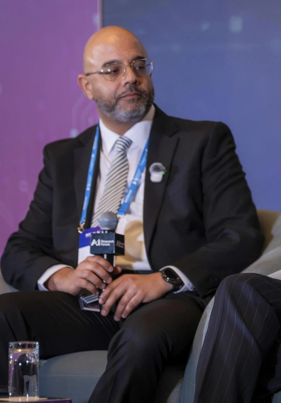 Noel D'Costa on a panel at the AI Research Forum